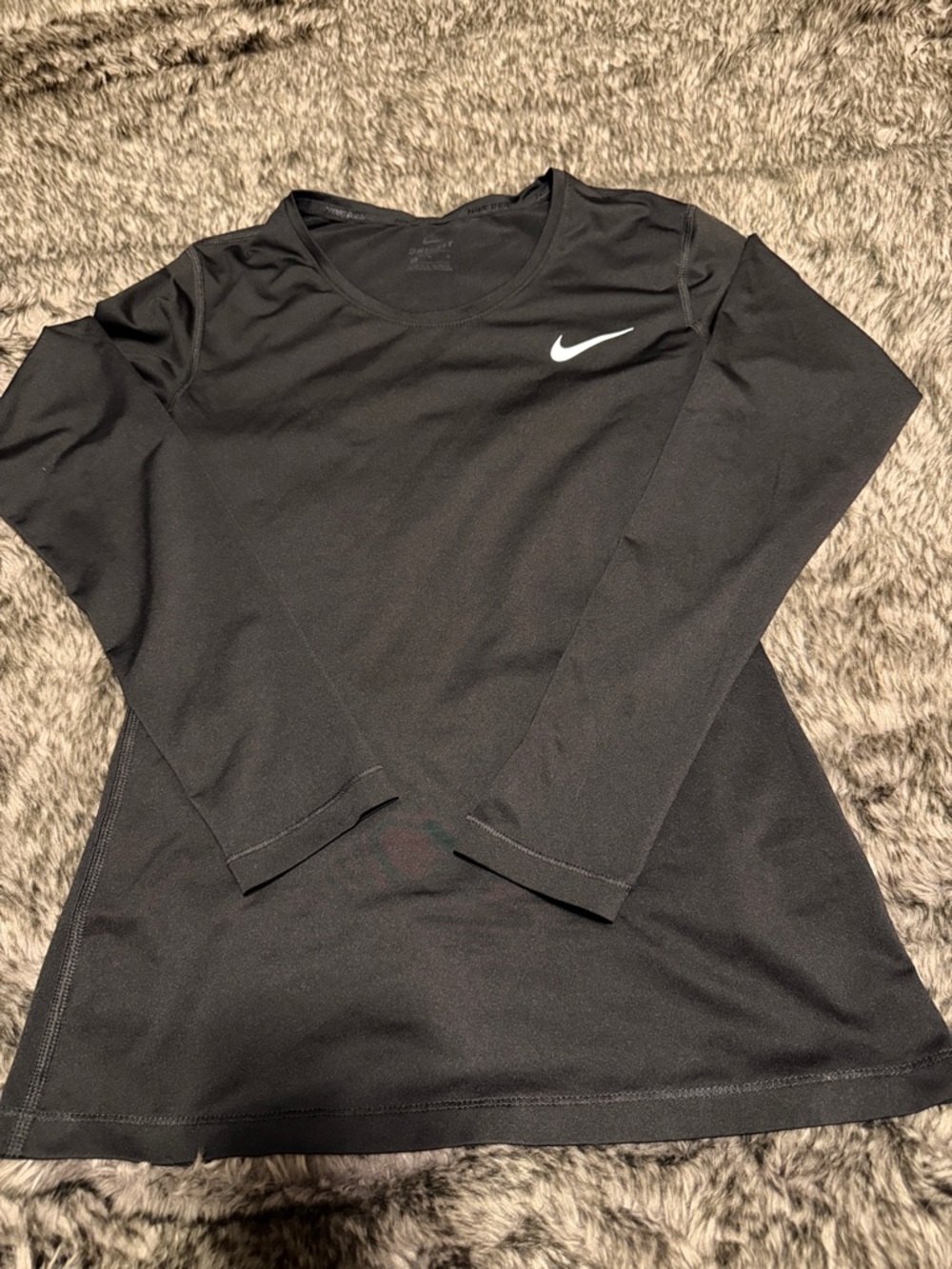 Nike Black Long Sleeve Athletic Top with White Swoosh